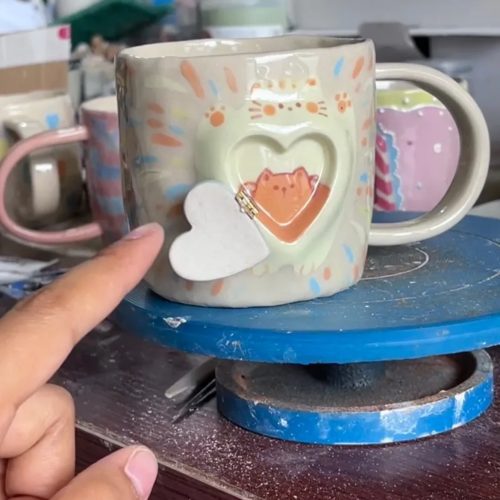 HandmadeSurpriseCat sHeartCeramicCup2 1